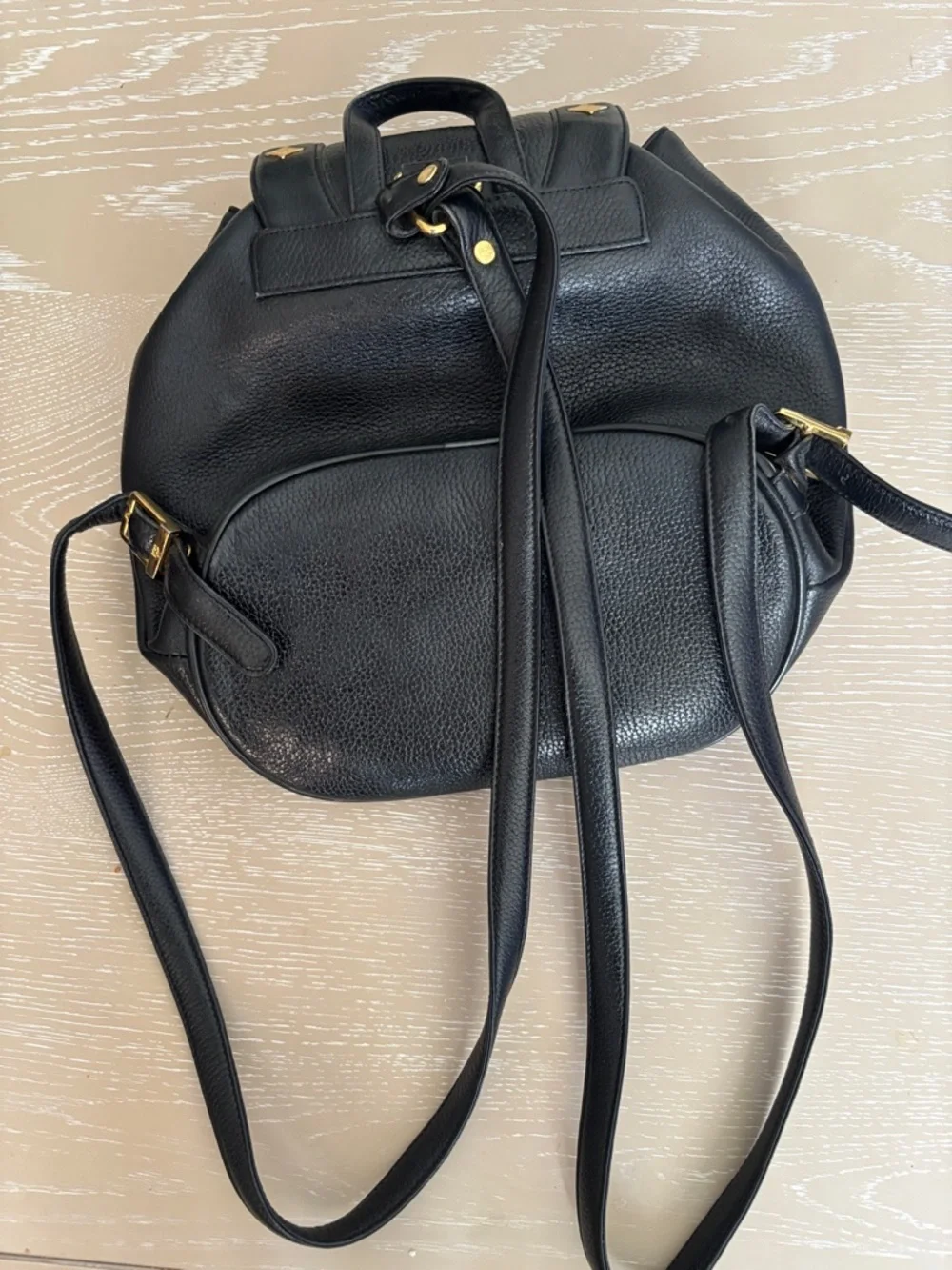 MCM Black Pebbled Leather Tassel Drawstring Backpack with Gold Hardware - Picture 2 of 3